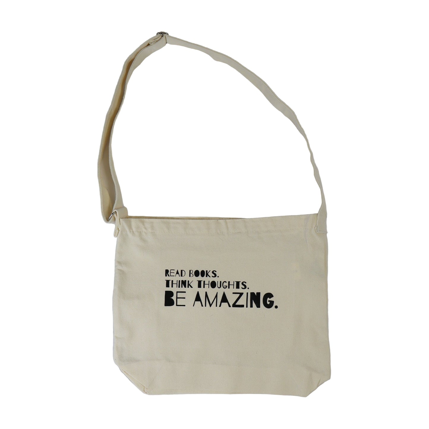Beige tote bag with motivational text on a white background