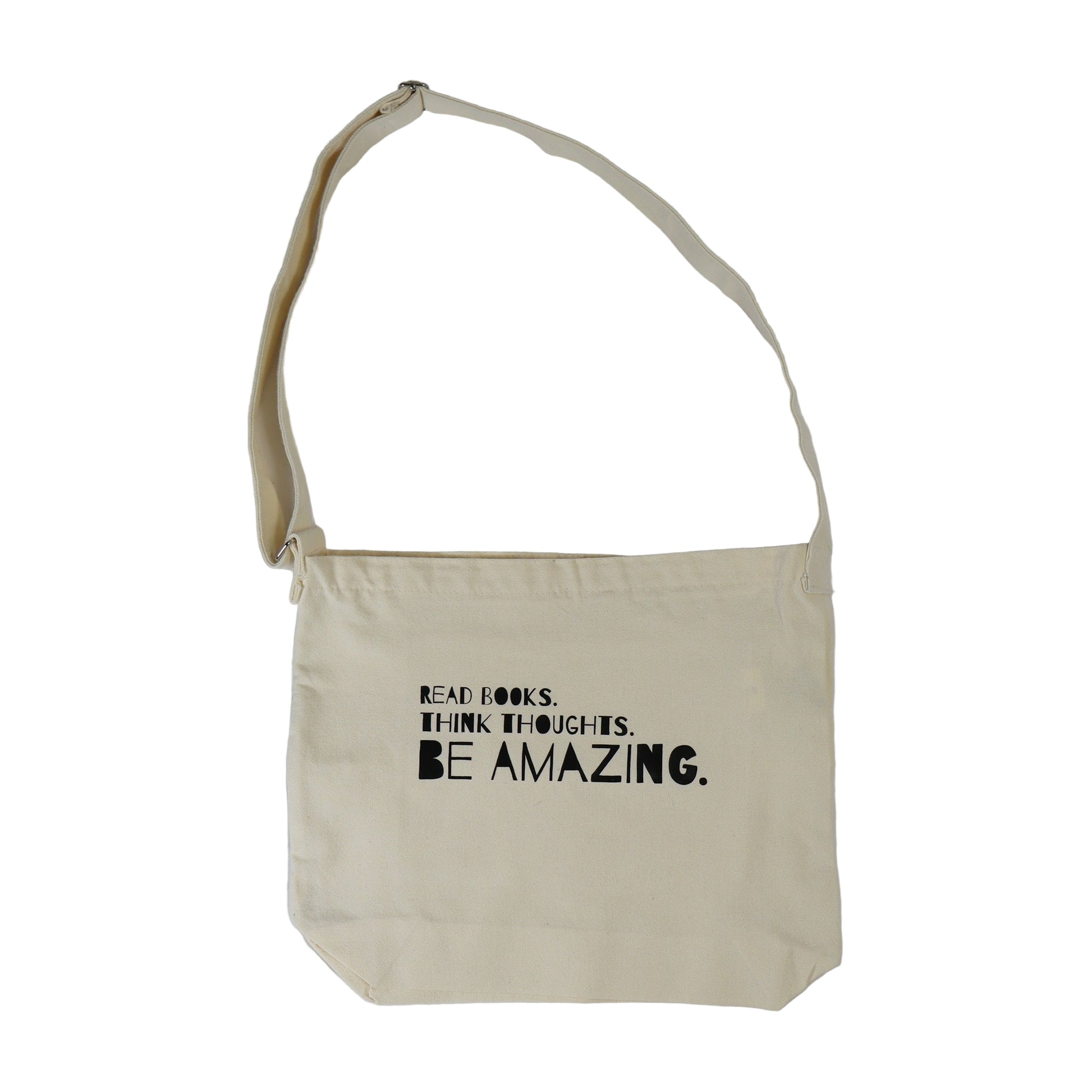 Beige tote bag with motivational text on a white background